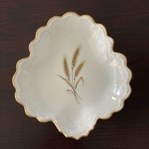 Limoge Bowl scalloped edge. White with gold trim. Wheat in center.